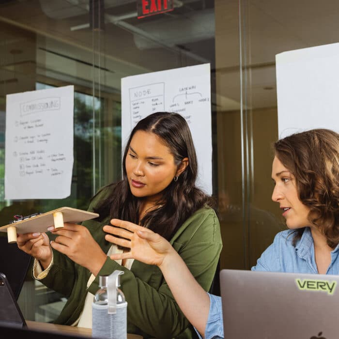 IoT Engineering leader showcasing a device prototype